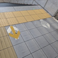 Floor markings tell you to walk on the right, bus used to say left…